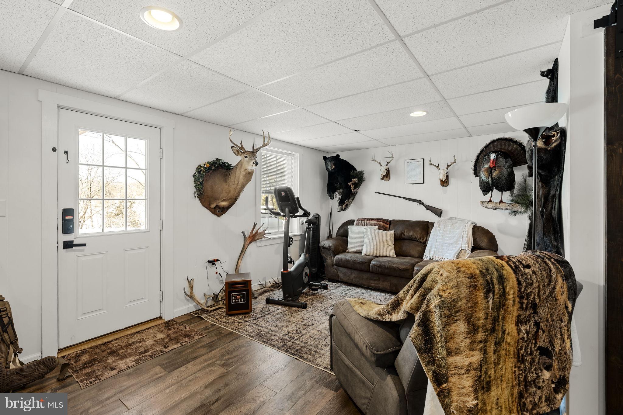 108 Red Well Road New Holland, PA 17557 - Photo 47 of 59 a living room with furniture a window and gym equipment