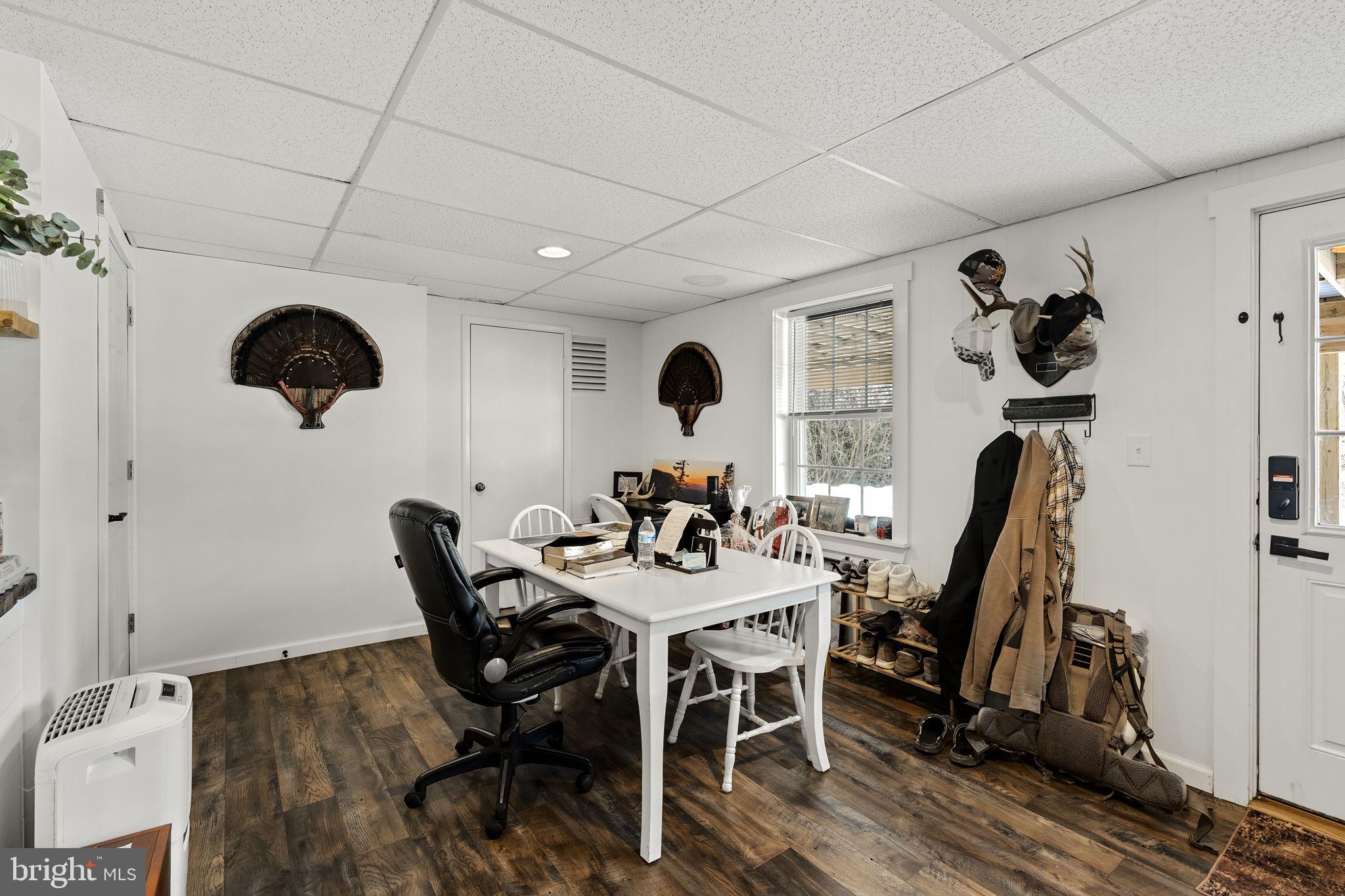 108 Red Well Road New Holland, PA 17557 - Photo 49 of 59 a view of a dining room with furniture and wooden floor
