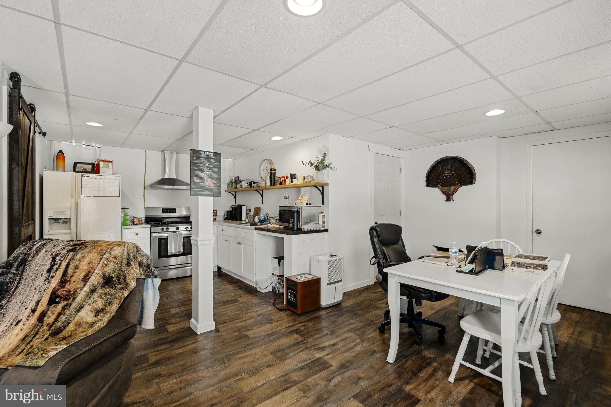 108 Red Well Road New Holland, PA 17557 - Photo 50 of 59 a view of a dining room with furniture and wooden floor