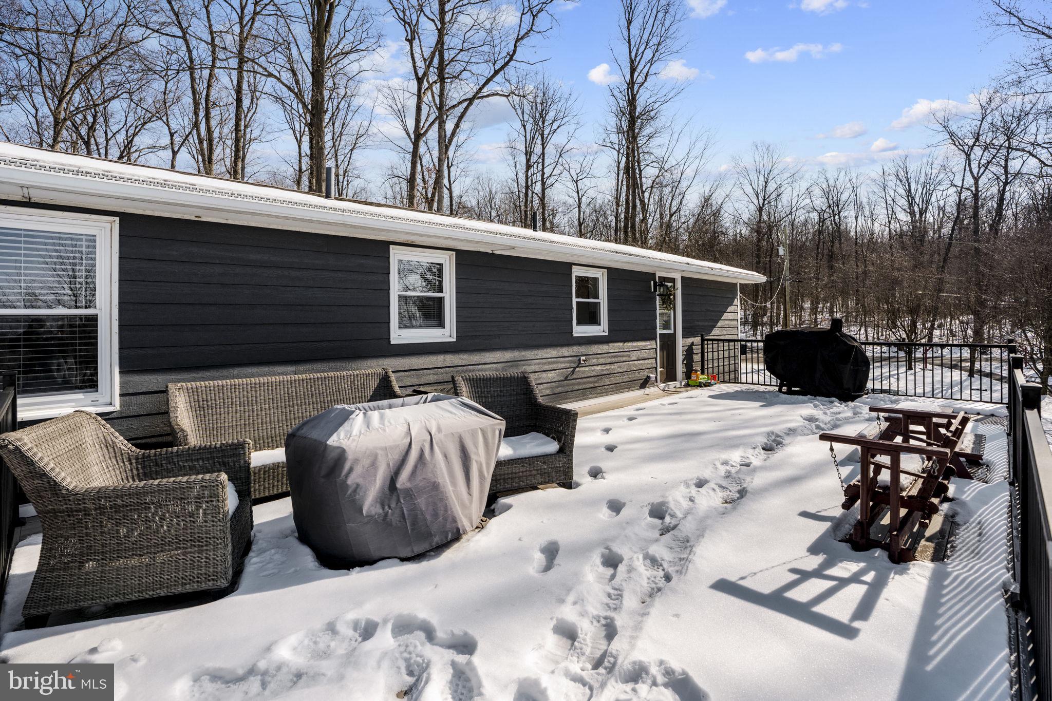 108 Red Well Road New Holland, PA 17557 - Photo 9 of 59 a view of backyard with outdoor seating