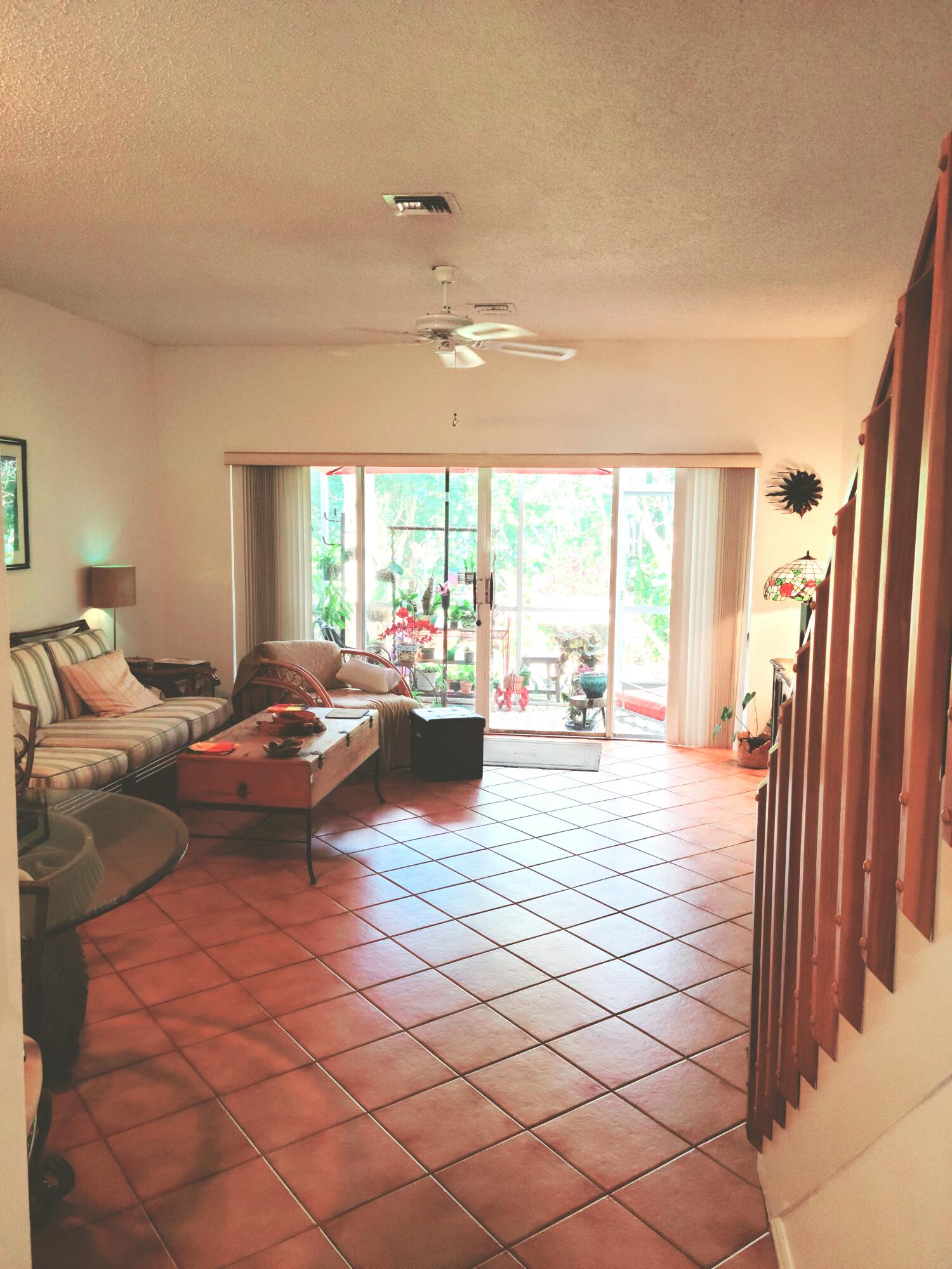 5121 Sabal Gardens Lane, Unit 2 Boca Raton, FL 33487 - Photo 4 of 25 a living room with a large window