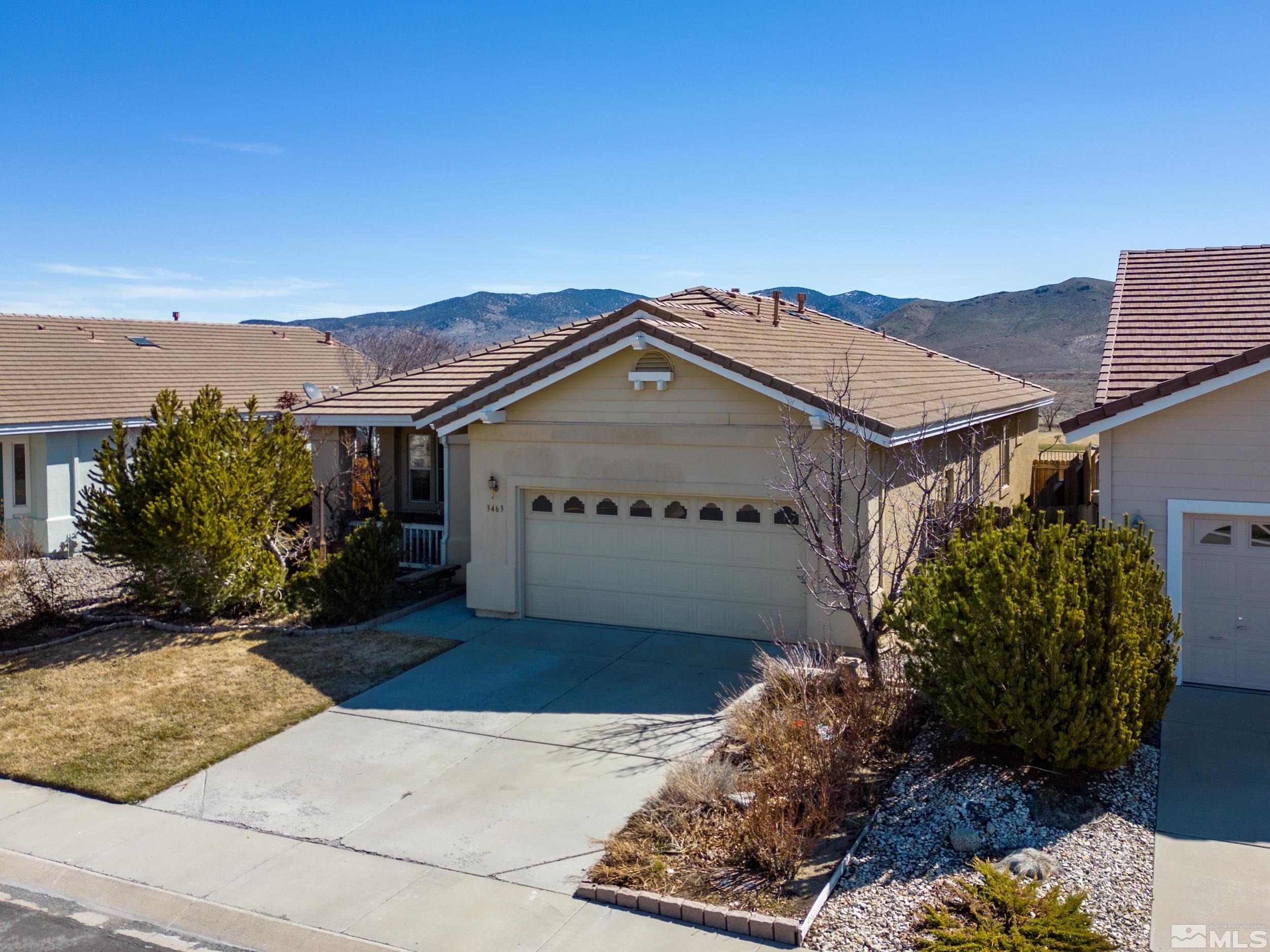 3463 Long Drive Minden, NV 89423 - Photo 2 of 40 a view of a house with a garden