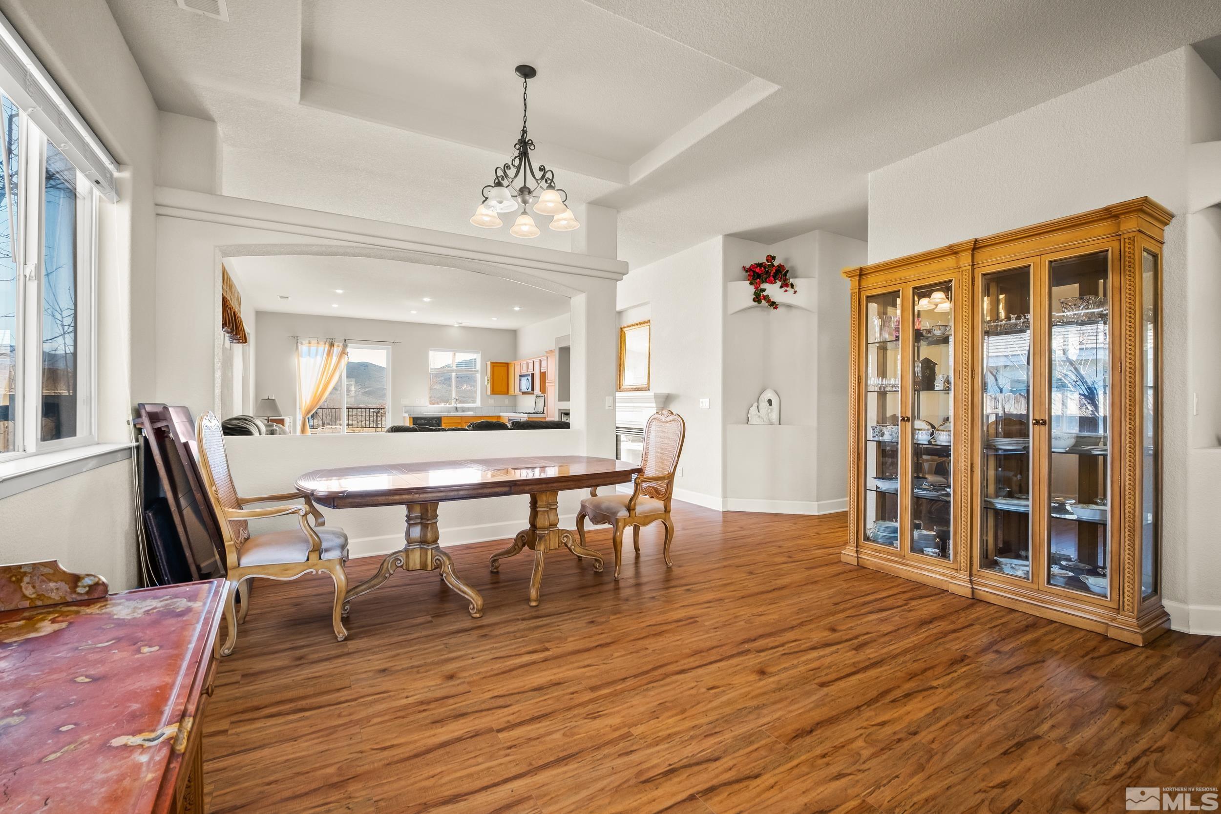3463 Long Drive Minden, NV 89423 - Photo 6 of 40 a view of a dining room with furniture window and wooden floor