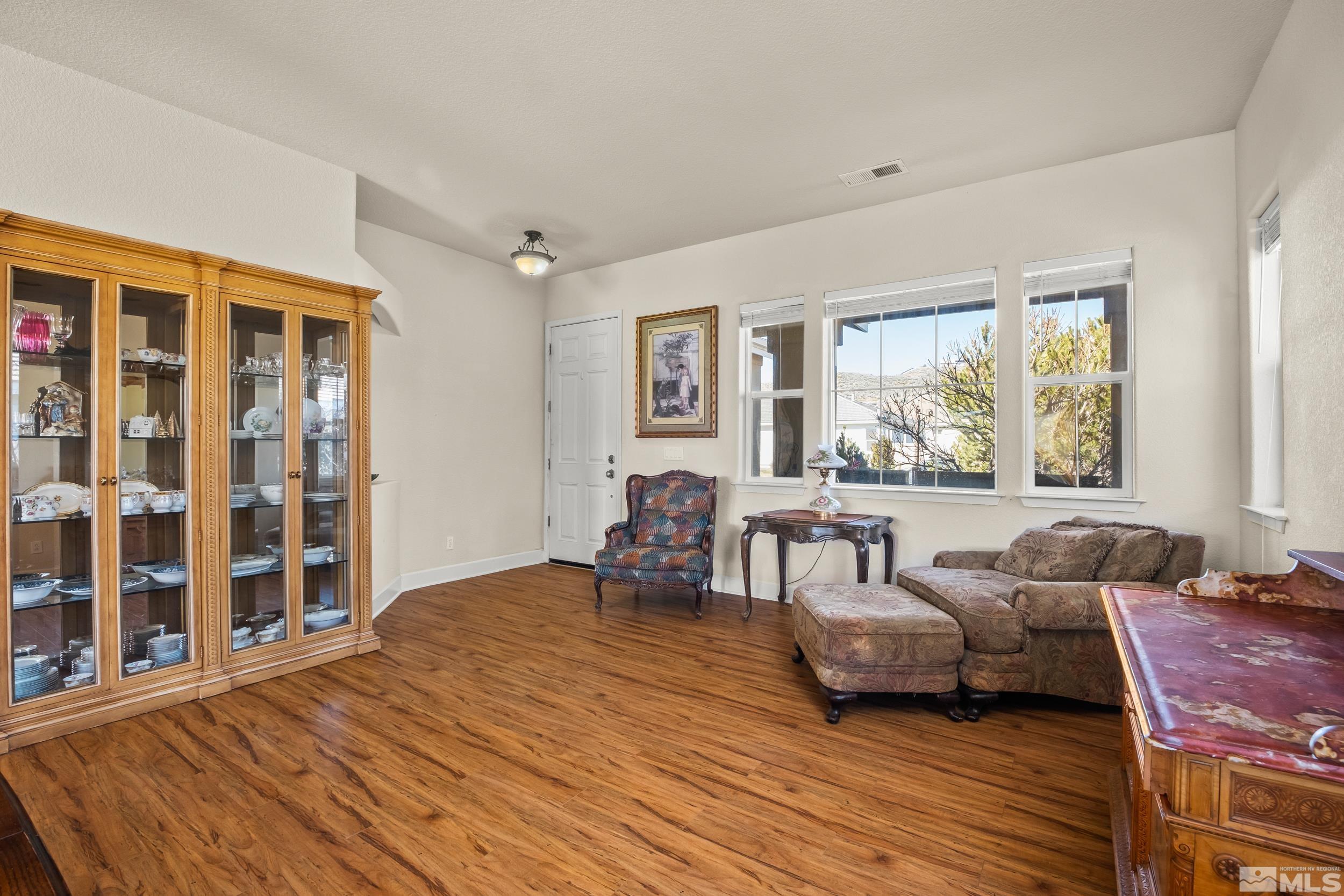 3463 Long Drive Minden, NV 89423 - Photo 7 of 40 a living room with furniture and windows