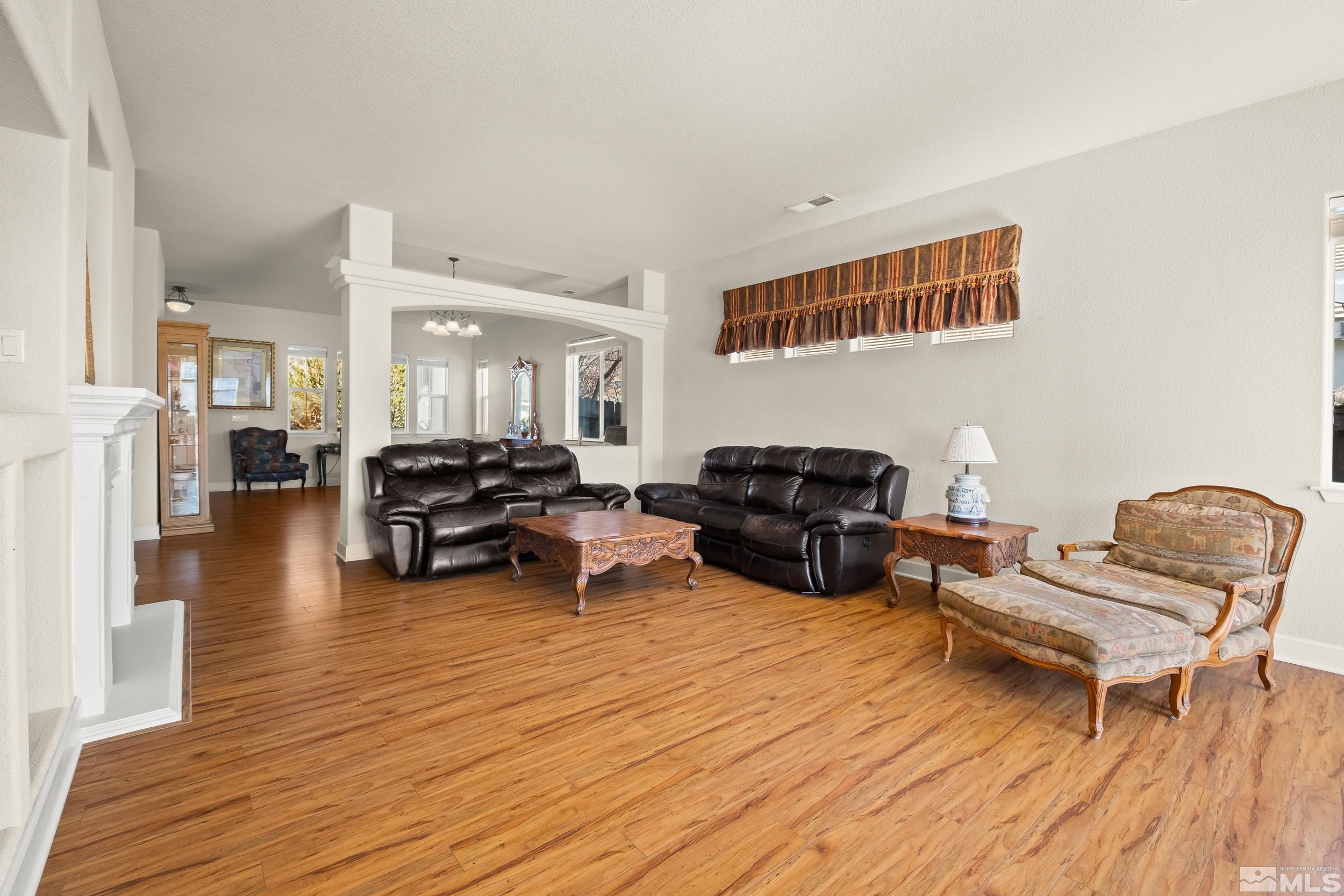 3463 Long Drive Minden, NV 89423 - Photo 8 of 40 a living room with furniture and a wooden floor