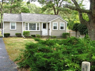 10 Silverleaf Lane West Yarmouth, MA 02673 - Photo 2 of 12 a house view with a garden space