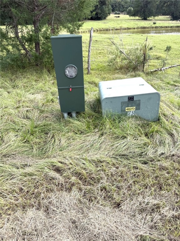 5878 East Boone Prairie Road, Unit COUNTYROAD Franklin, TX 77856 - Photo 40 of 42 a view of a outdoor space with a lake view