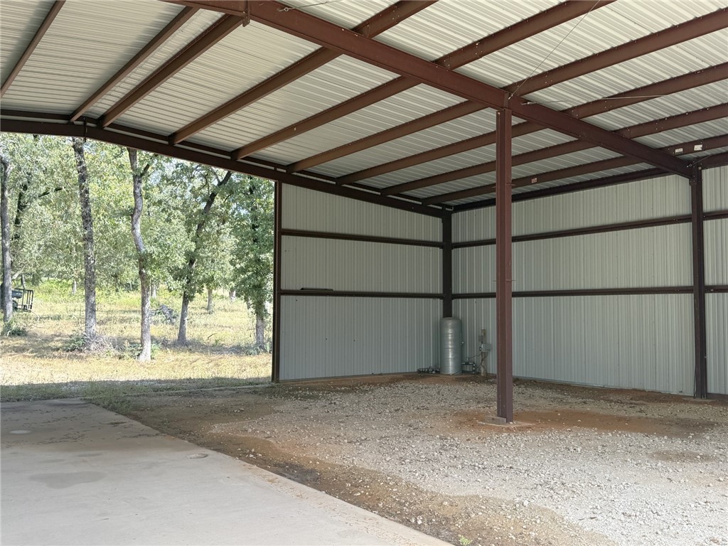 5878 East Boone Prairie Road, Unit COUNTYROAD Franklin, TX 77856 - Photo 41 of 42 a house with a outdoor space
