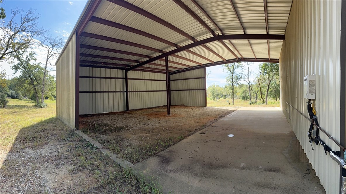 5878 East Boone Prairie Road, Unit COUNTYROAD Franklin, TX 77856 - Photo 6 of 42 a view of a backyard