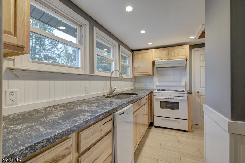 24 Brook Street Springfield, NJ 07081 - Photo 24 of 28 a kitchen with a stove and a sink