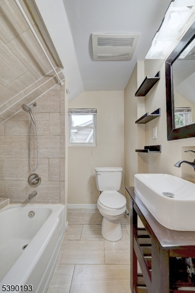 24 Brook Street Springfield, NJ 07081 - Photo 26 of 28 a bathroom with a sink a toilet and shower