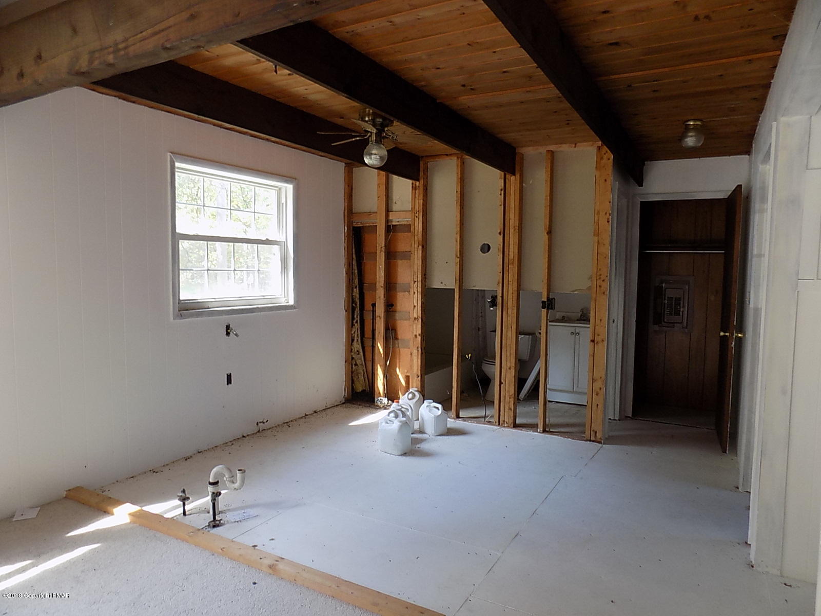 8 Cherry Ridge Road Bushkill, PA 18324 - Photo 5 of 9 an empty room with window