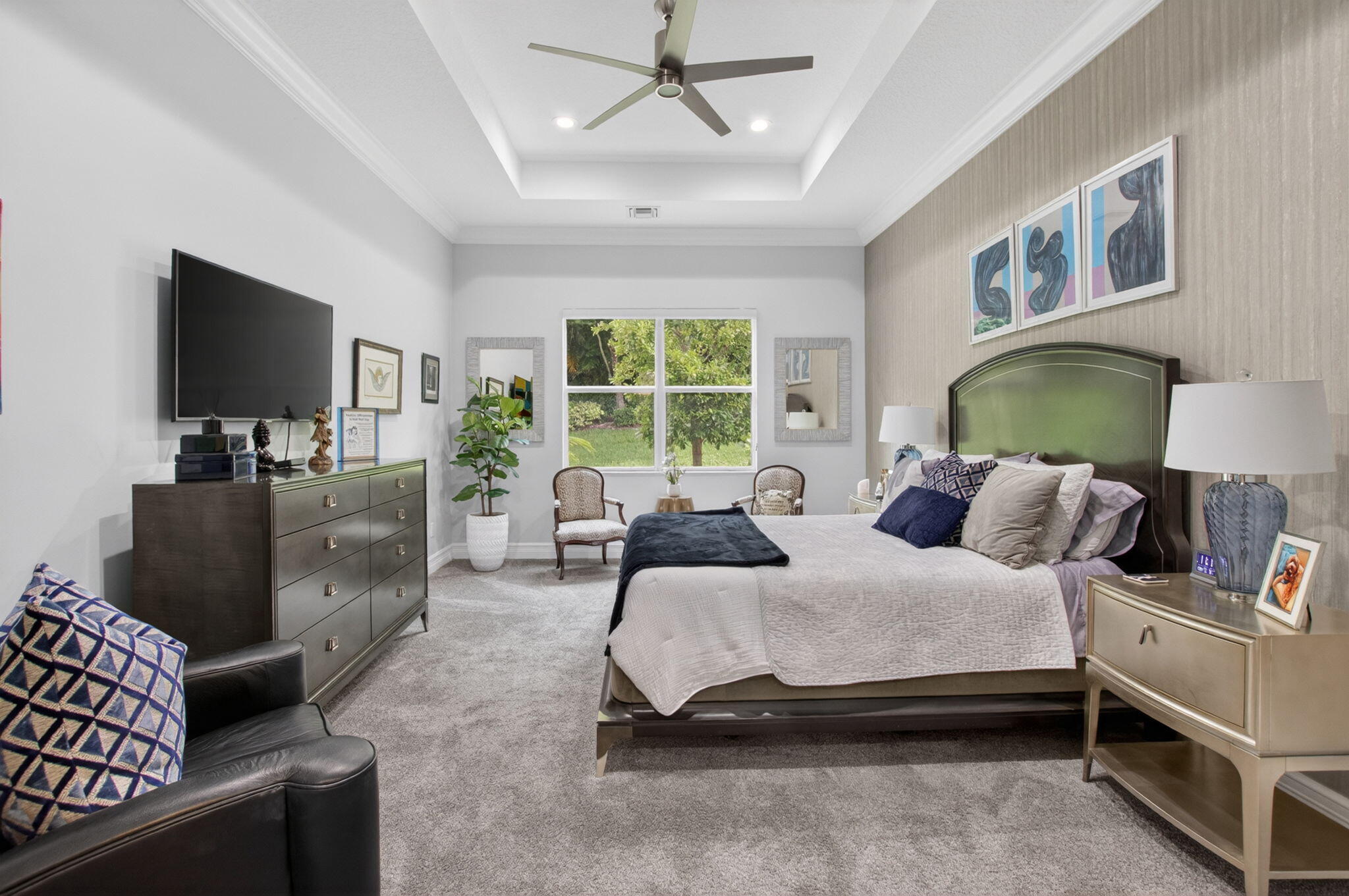 8263 Arabian Range Road Boynton Beach, FL 33473 - Photo 29 of 52 a bedroom with a bed and a couch