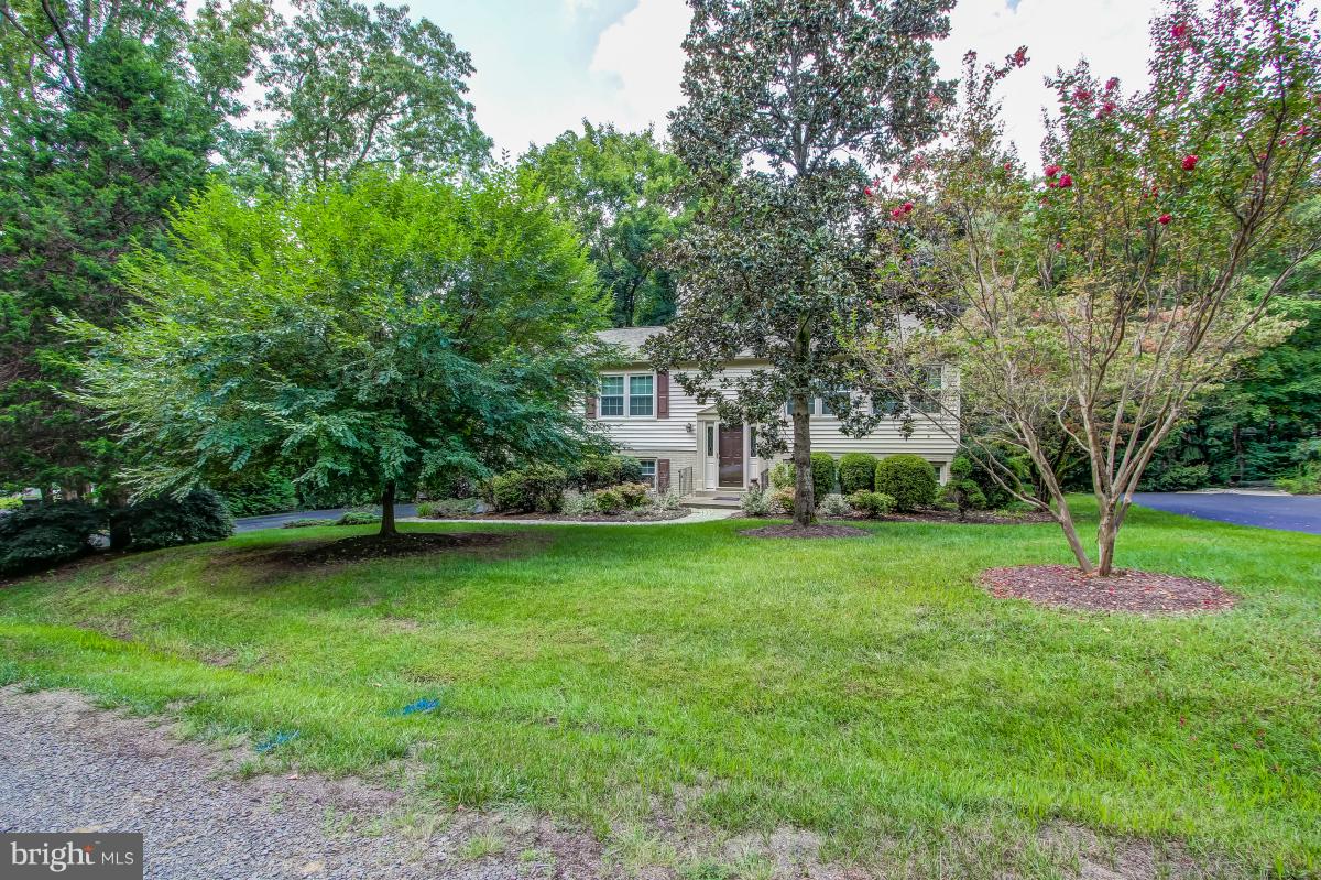 1814 Cranberry Lane Reston, VA 20191 - Photo 2 of 30 a view of a tree in front of a house