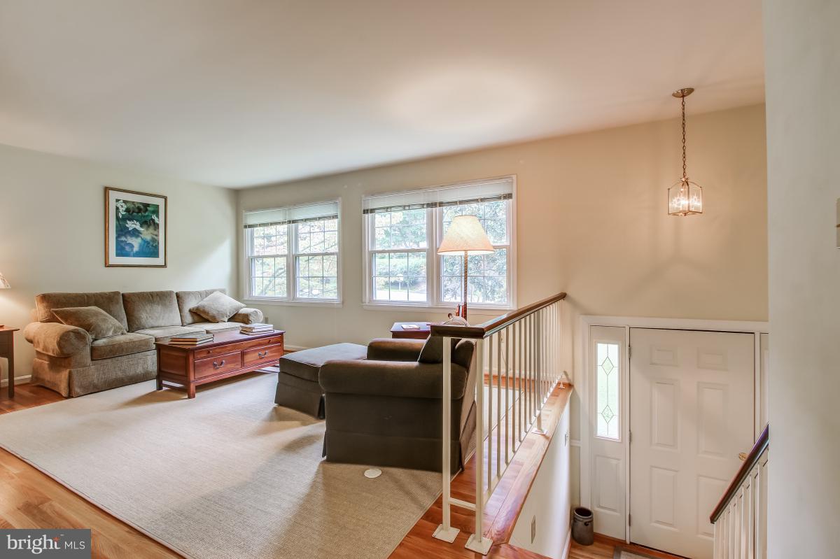 1814 Cranberry Lane Reston, VA 20191 - Photo 15 of 30 a living room with furniture and a window