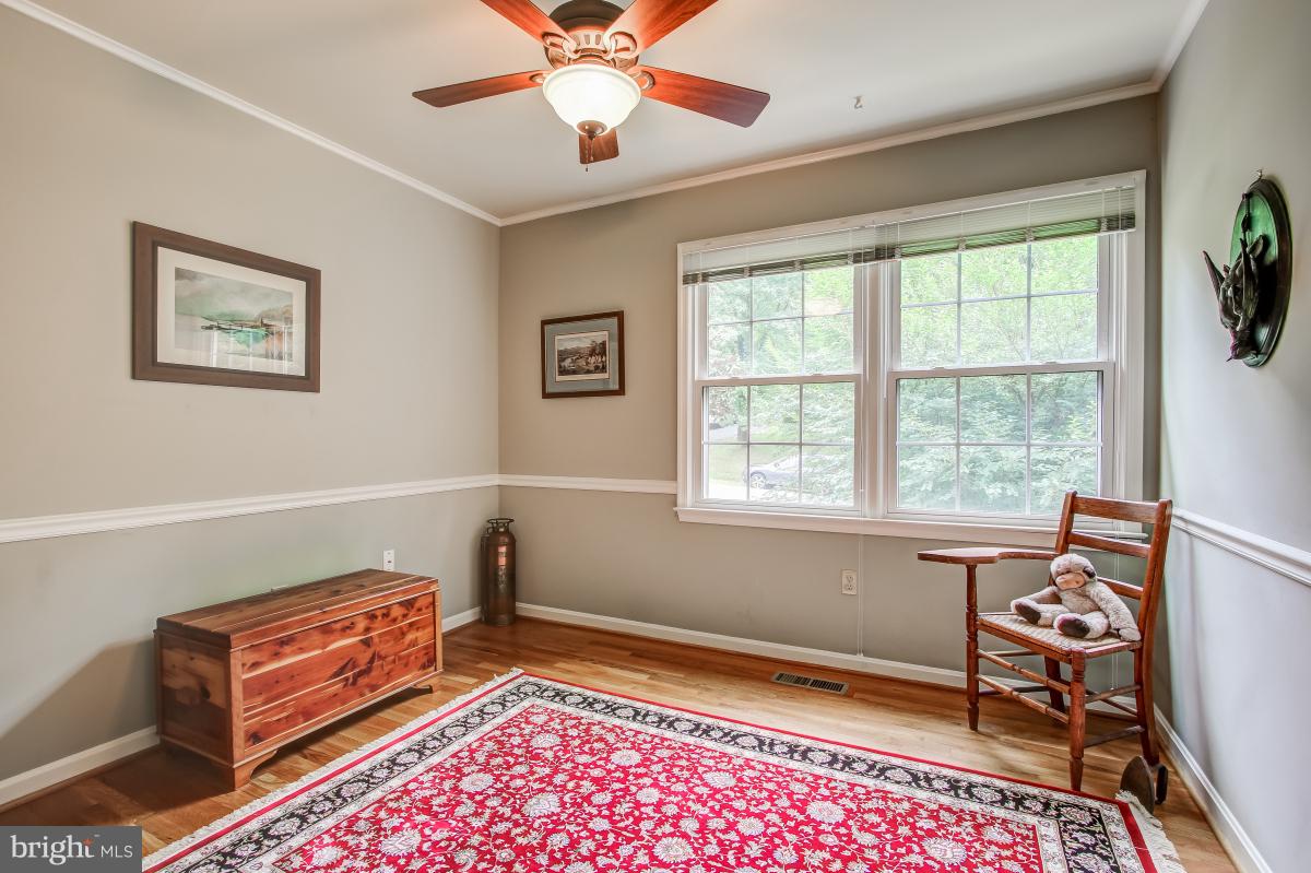1814 Cranberry Lane Reston, VA 20191 - Photo 17 of 30 a livingroom with workspace and a window
