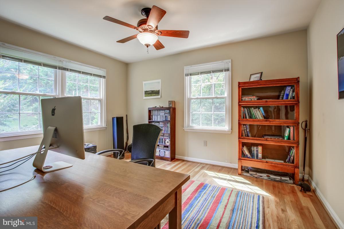 1814 Cranberry Lane Reston, VA 20191 - Photo 22 of 30 a view of a workspace with furniture and a window