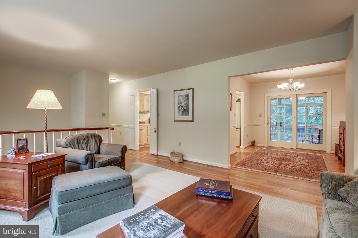 1814 Cranberry Lane Reston, VA 20191 - Photo 6 of 30 a living room with furniture and a window