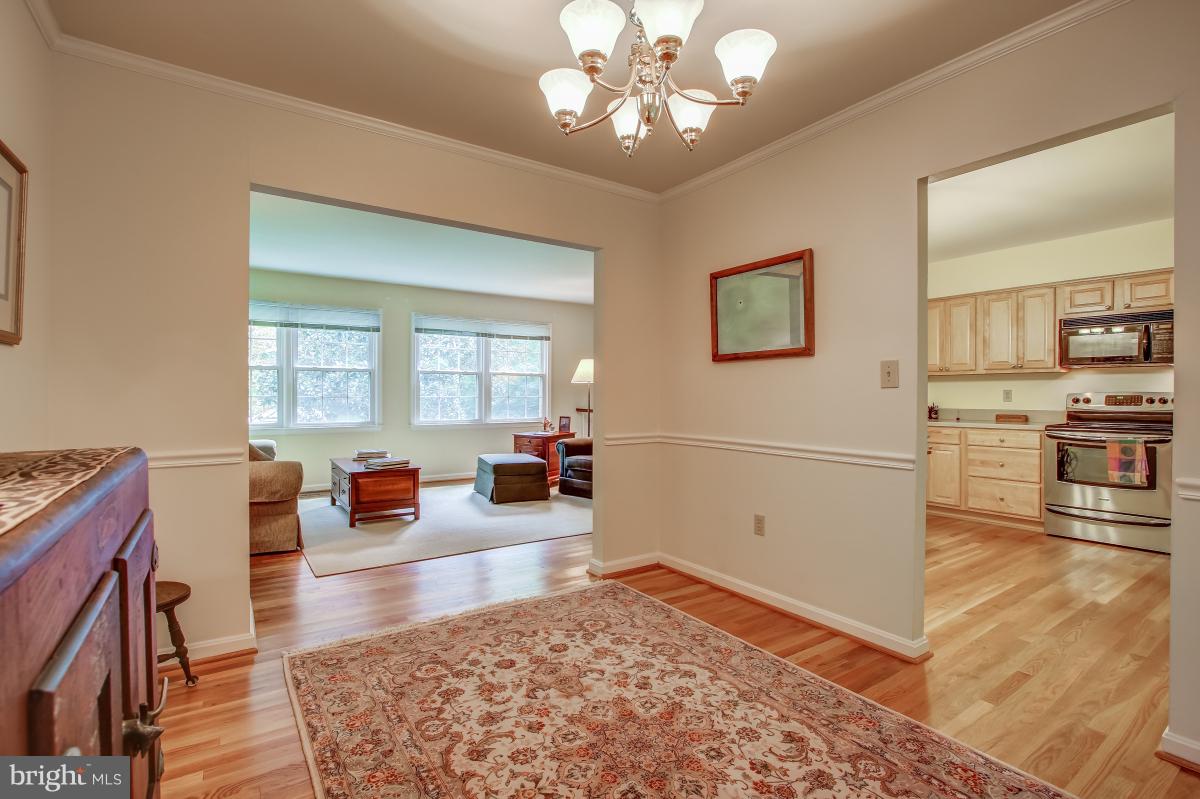 1814 Cranberry Lane Reston, VA 20191 - Photo 8 of 30 a view of a livingroom with furniture hardwood floor and a living room