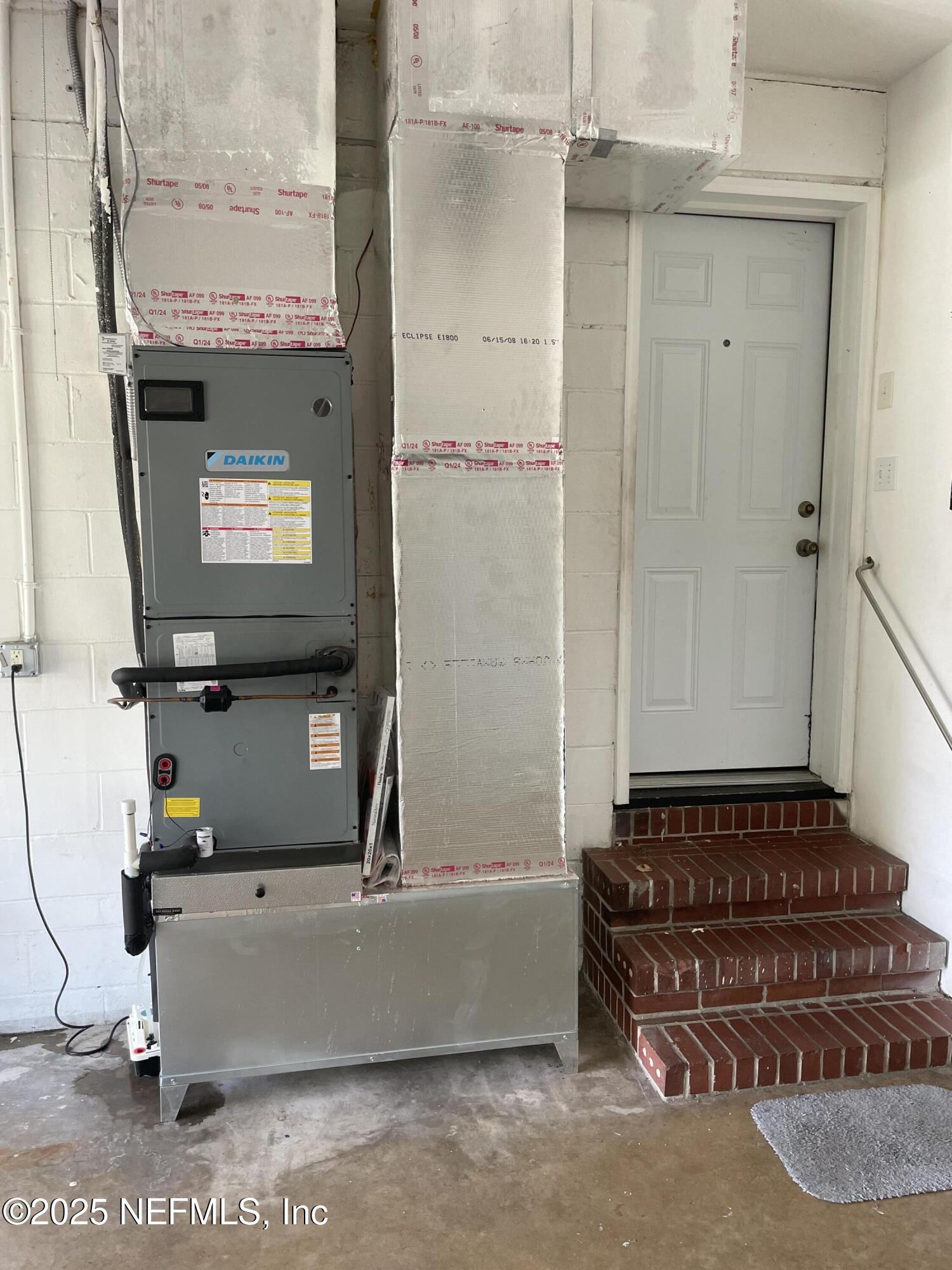 6938 Corkwood Road Jacksonville, FL 32277 - Photo 22 of 25 a bathroom with a bathtub and shower