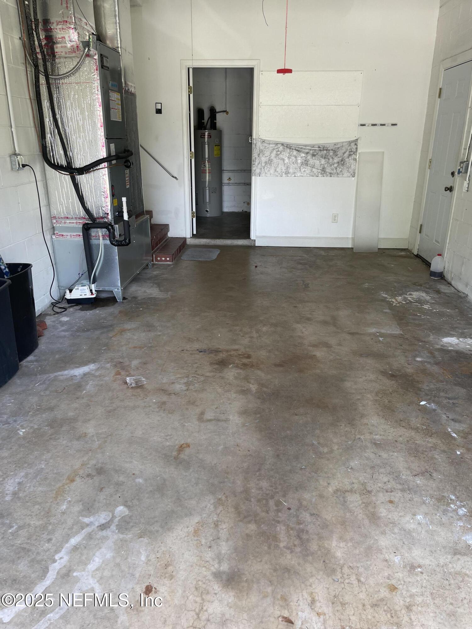6938 Corkwood Road Jacksonville, FL 32277 - Photo 23 of 25 a view of a storage & utility room
