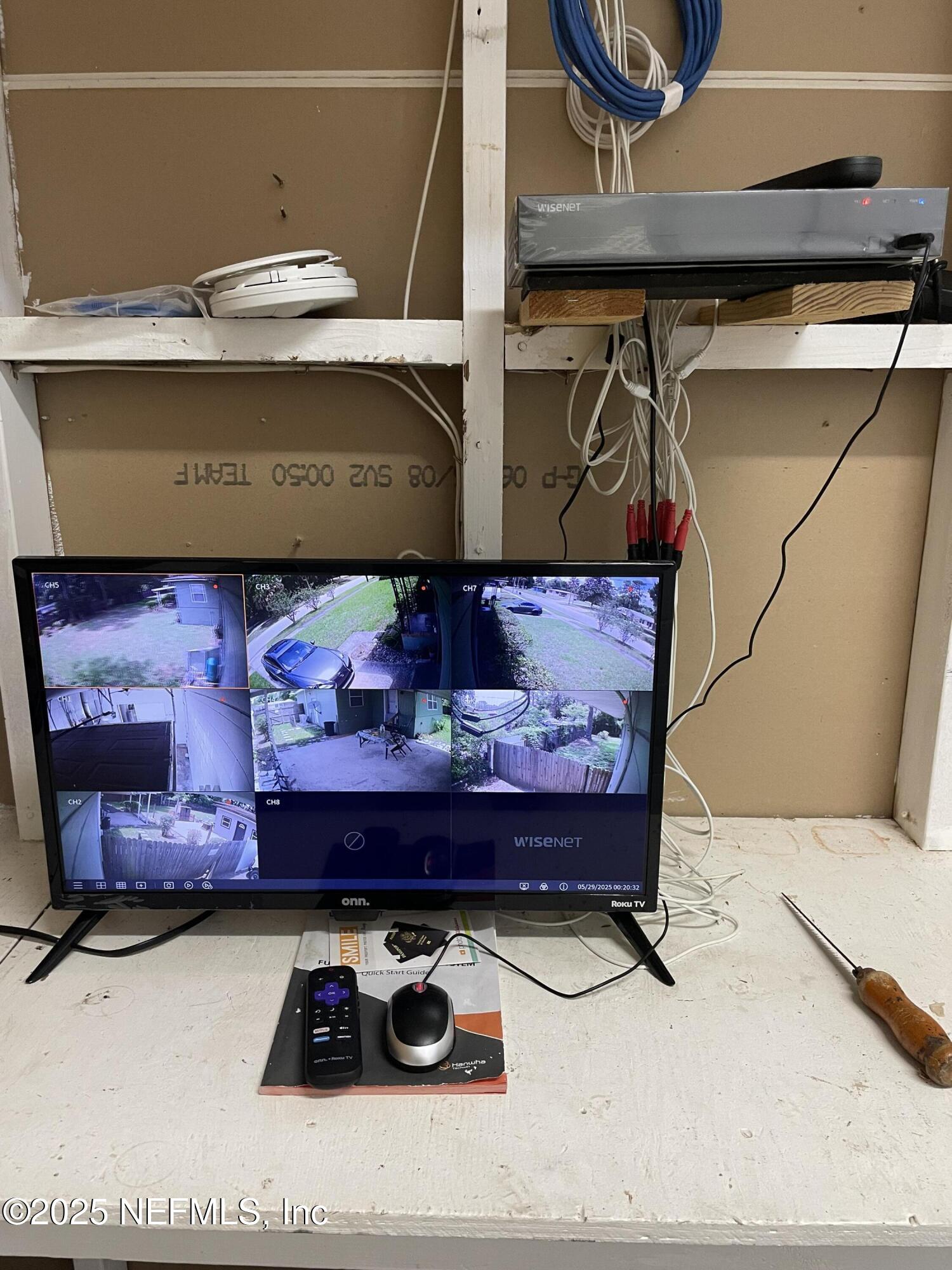 6938 Corkwood Road Jacksonville, FL 32277 - Photo 24 of 25 a room with storage and utility room