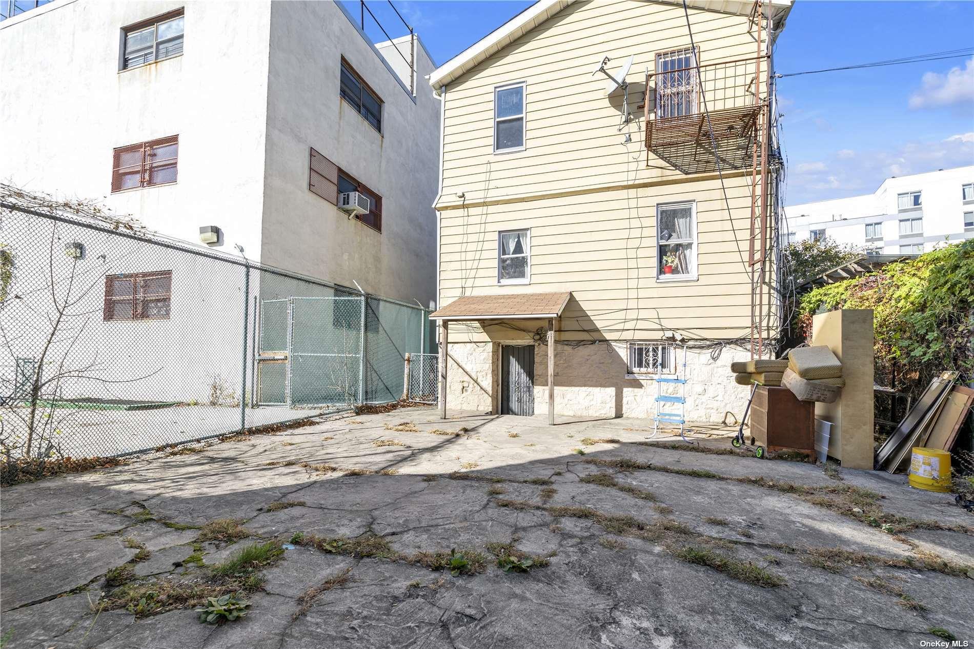 111-24 Northern Boulevard Queens, NY 11368 - Photo 28 of 29 a view of a house with a street