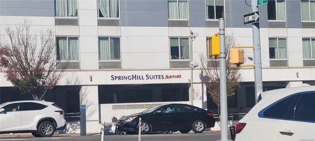 a view of multiple house with parking space