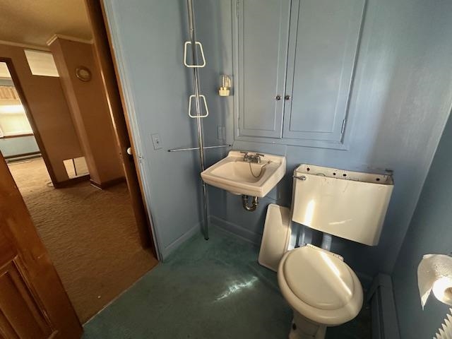 412 Monroe Street Eveleth, MN 55734 - Photo 15 of 22 Bathroom featuring sink and toilet