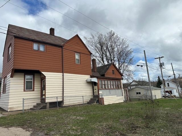 412 Monroe Street Eveleth, MN 55734 - Photo 20 of 22 Back of house with a yard
