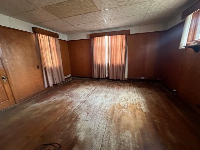 412 Monroe Street Eveleth, MN 55734 - Photo 7 of 22 Empty room with dark hardwood / wood-style floors