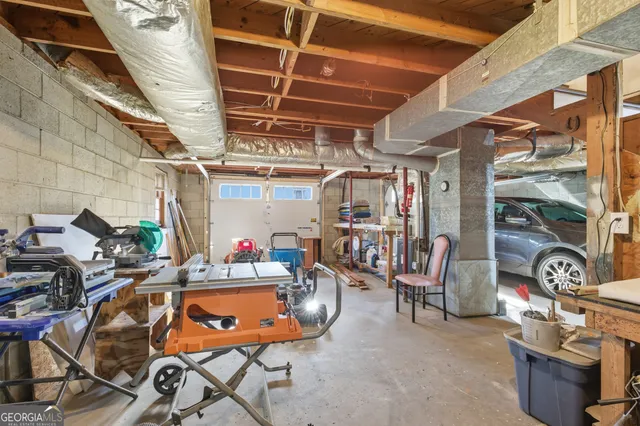 a view of a pathway along with potted plants
