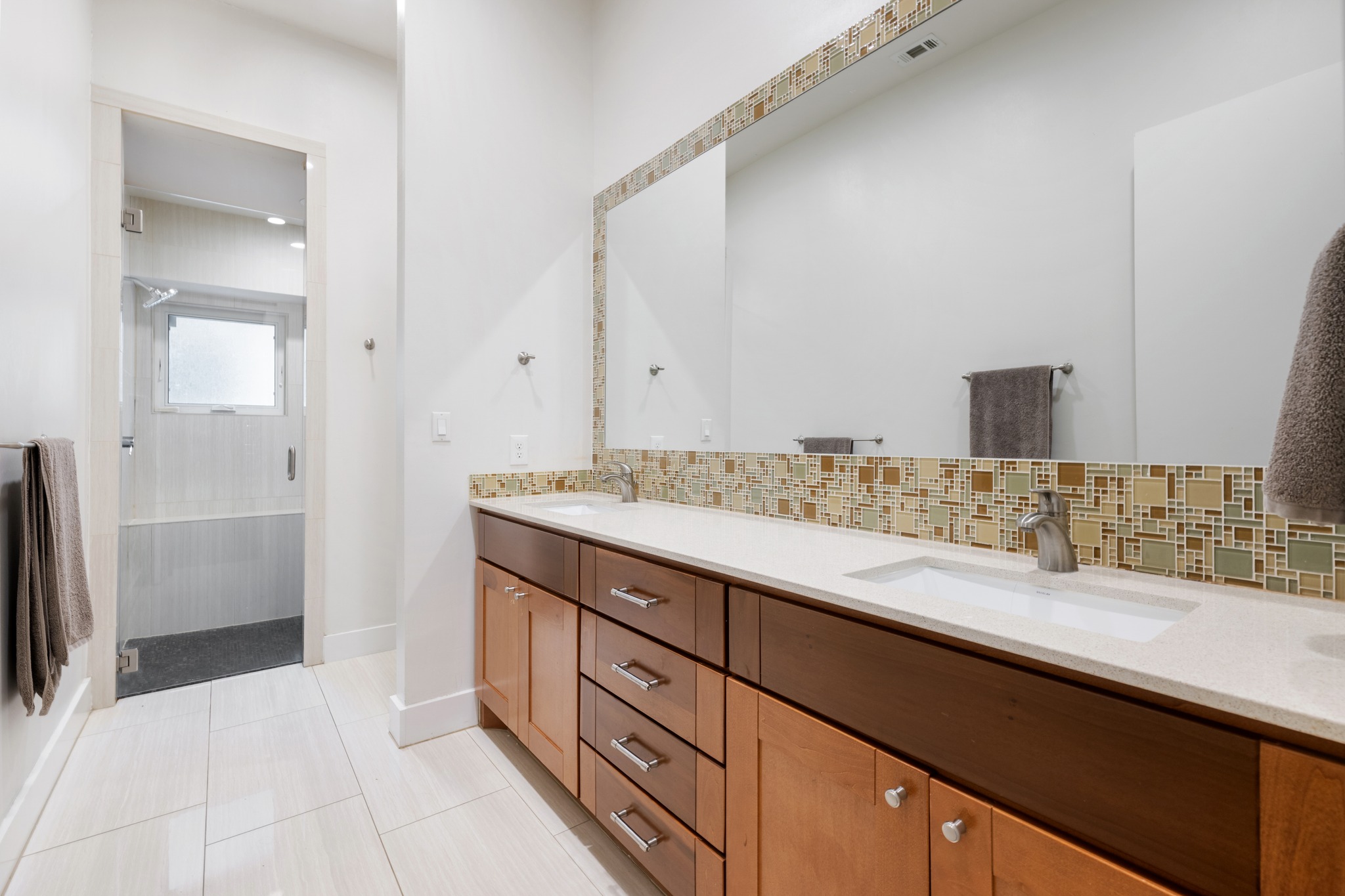 4904 Duval Street, Unit A Austin, TX 78751 - Photo 19 of 39 a bathroom with a sink and a mirror