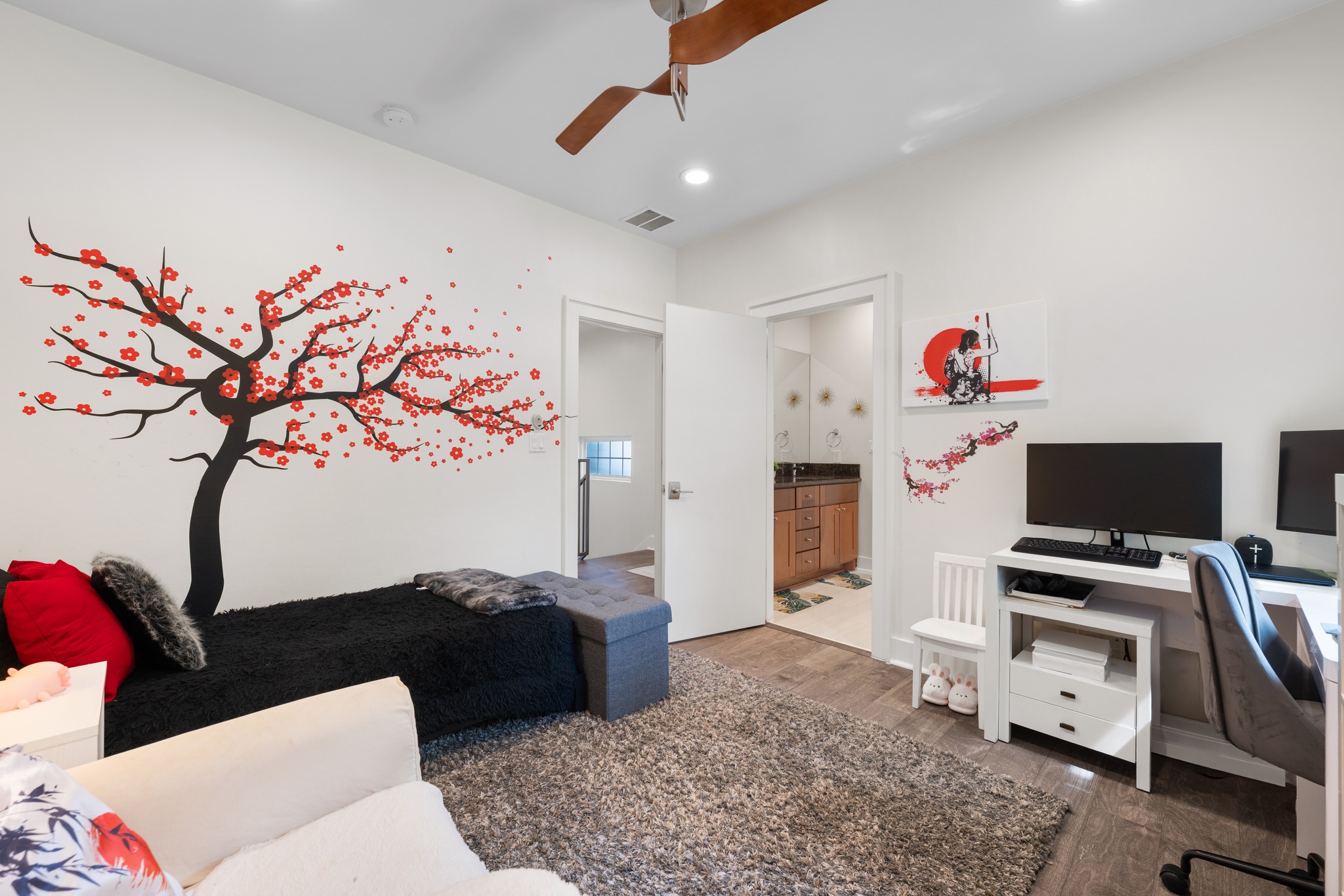 4904 Duval Street, Unit A Austin, TX 78751 - Photo 28 of 39 a living room with furniture and a flat screen tv