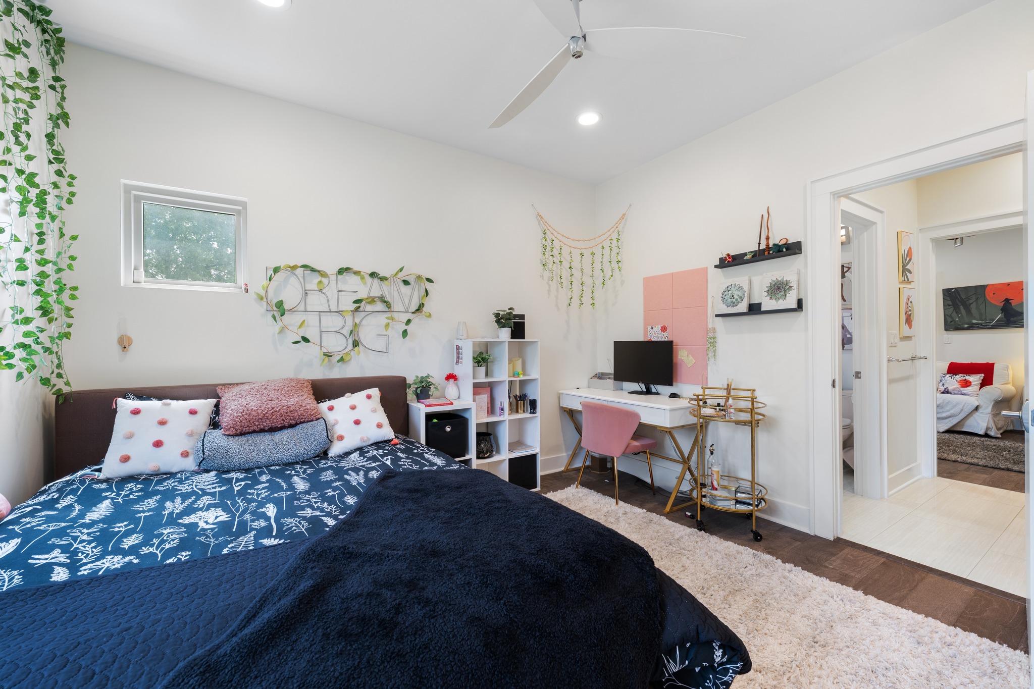 4904 Duval Street, Unit A Austin, TX 78751 - Photo 32 of 39 a bedroom with furniture and a bed