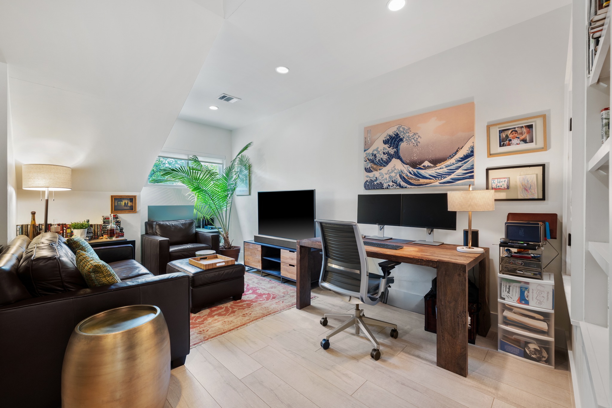 4904 Duval Street, Unit A Austin, TX 78751 - Photo 33 of 39 a living room with furniture and a flat screen tv