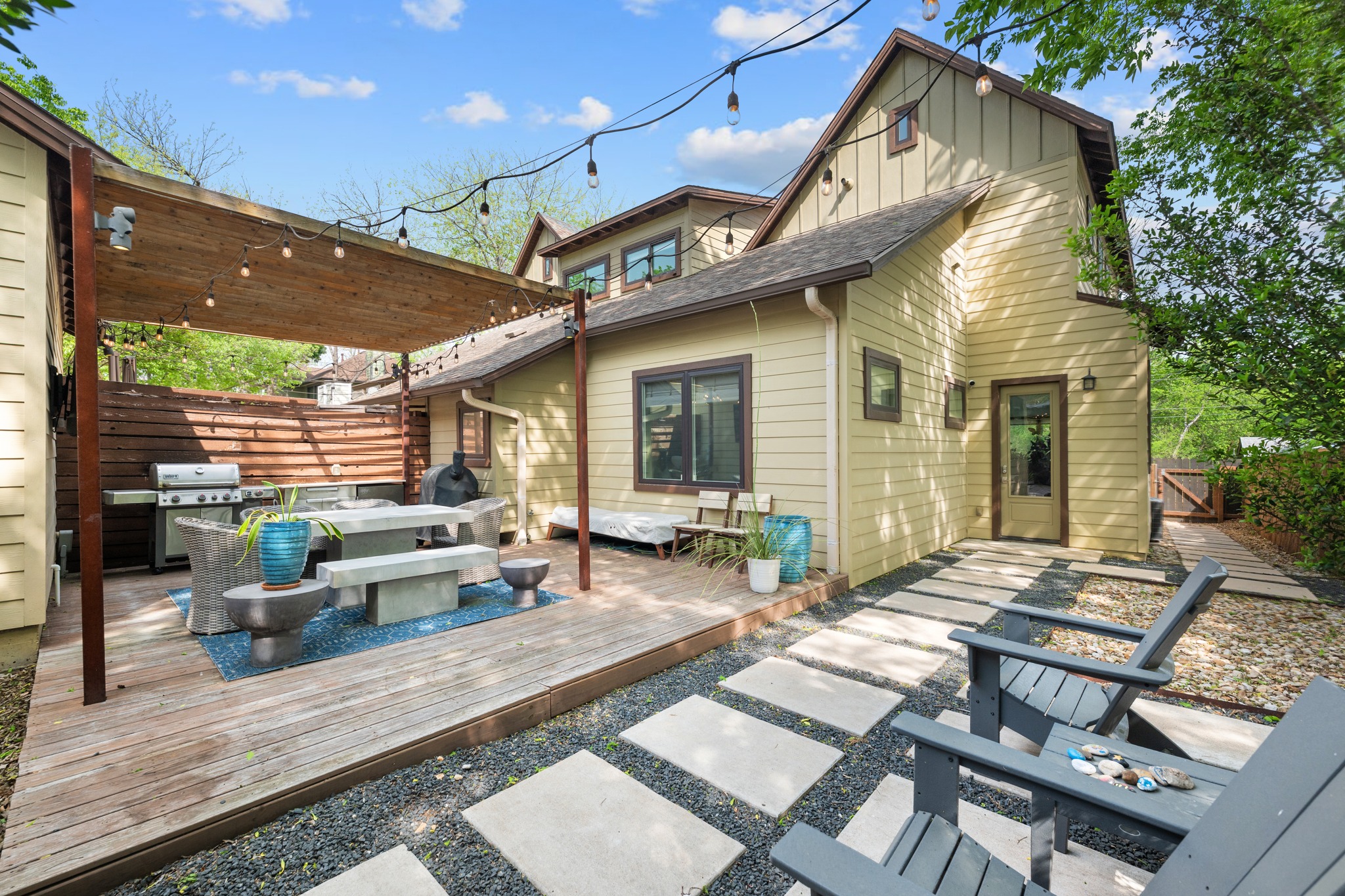 4904 Duval Street, Unit A Austin, TX 78751 - Photo 35 of 39 a outdoor space with patio the couches and a dining table with garden view