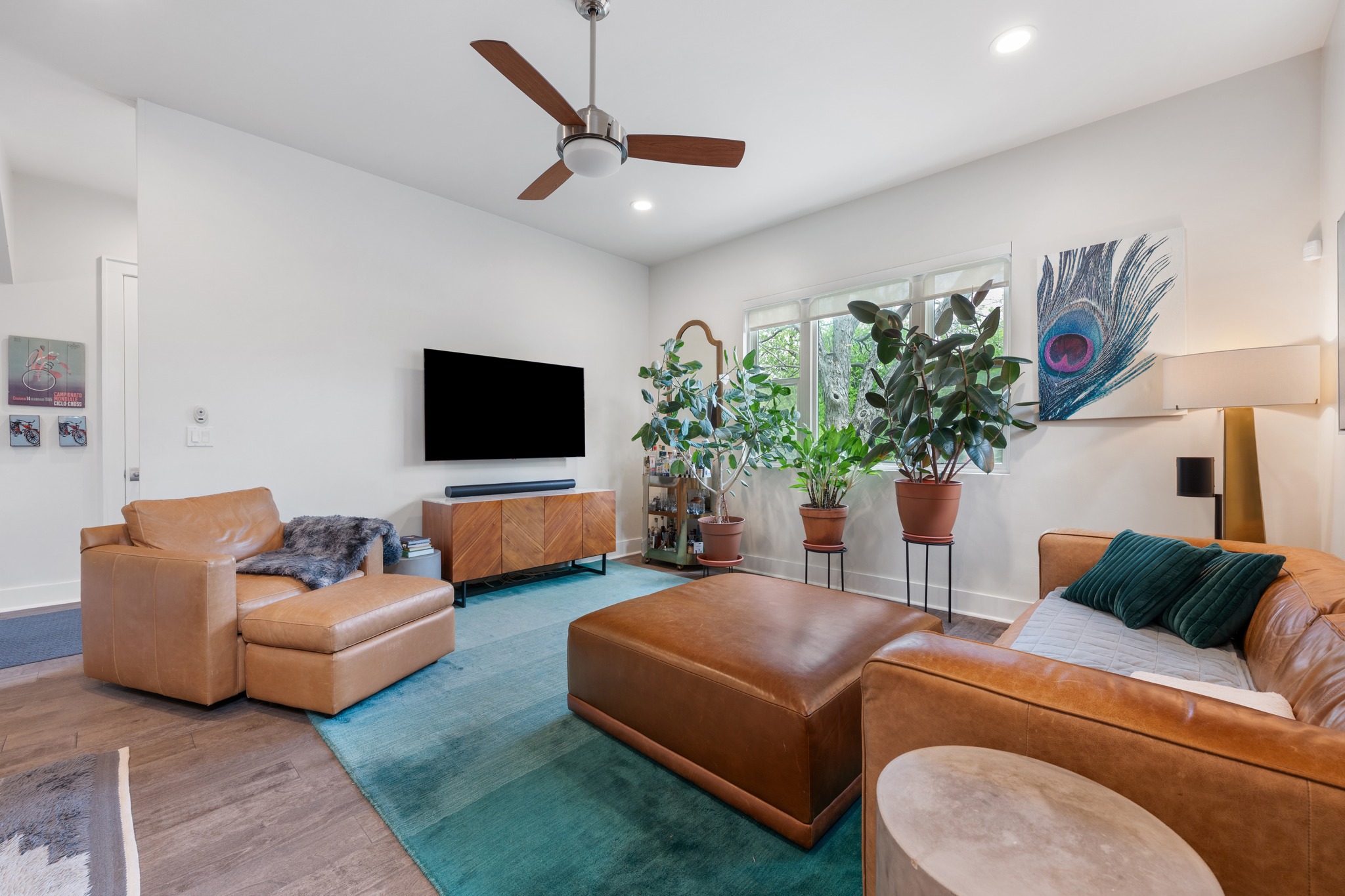 4904 Duval Street, Unit A Austin, TX 78751 - Photo 7 of 39 a living room with furniture and a flat screen tv