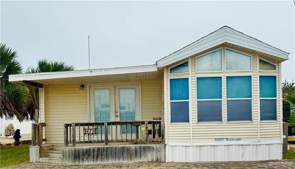 a front view of a house with balcony