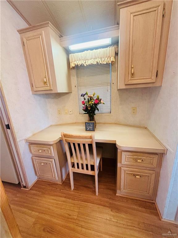 412 Sun Dial Circle Port Isabel, TX 78578 - Photo 14 of 37 a view of kitchen with furniture and wooden floor