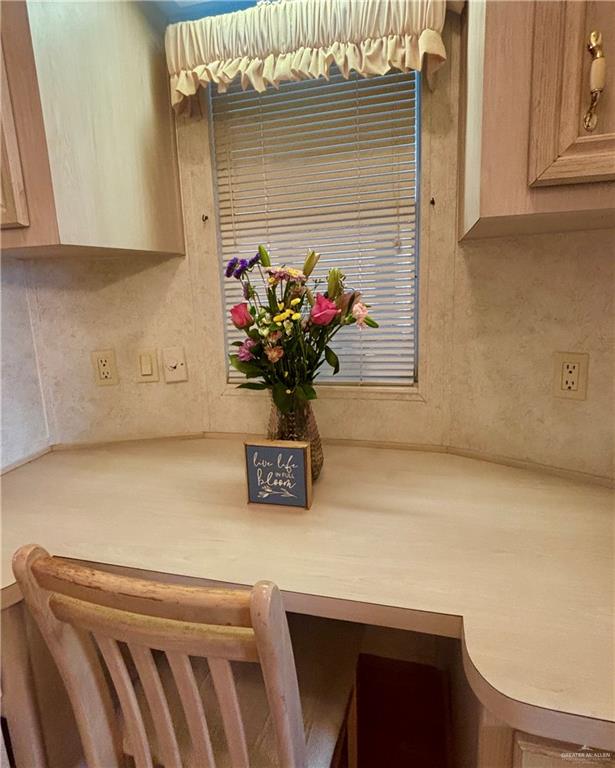 412 Sun Dial Circle Port Isabel, TX 78578 - Photo 15 of 37 a vase of flowers sitting on a table