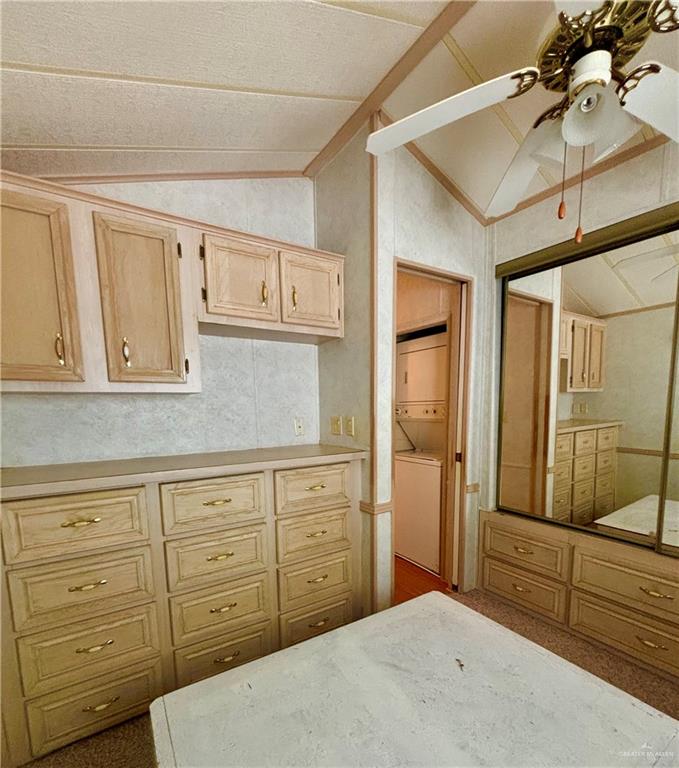 412 Sun Dial Circle Port Isabel, TX 78578 - Photo 17 of 37 a bedroom with a bed and a dresser