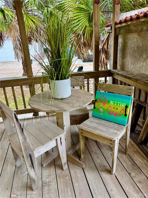 412 Sun Dial Circle Port Isabel, TX 78578 - Photo 21 of 37 a view of a chairs and table in a patio