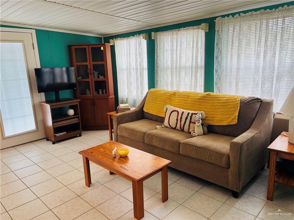 412 Sun Dial Circle Port Isabel, TX 78578 - Photo 5 of 37 a living room with furniture and a window
