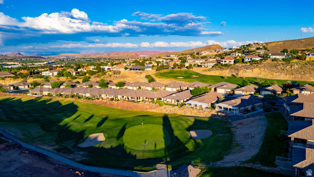 2212 Chippenham Court St. George, UT 84770 - Photo 72 of 75 Aerial view of residential area with a mountainous background and a golf club