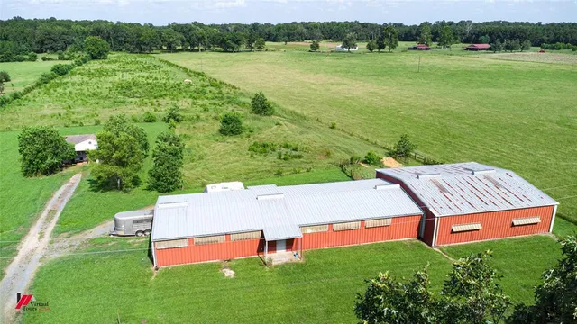 a view of a wooden deck and lake view