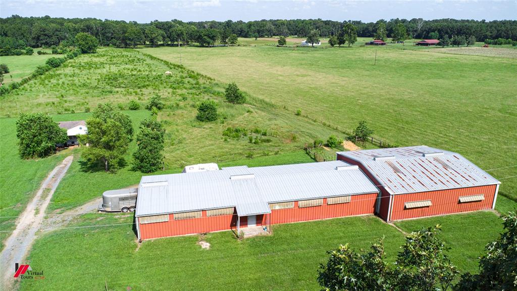 a view of a wooden deck and lake view