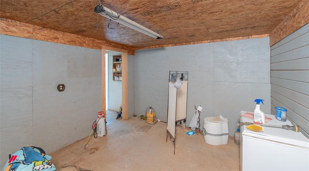 891 Pilgrim Rest Road Doyline, LA 71023 - Photo 13 of 37 a bathroom with a sink mirror vanity and toilet
