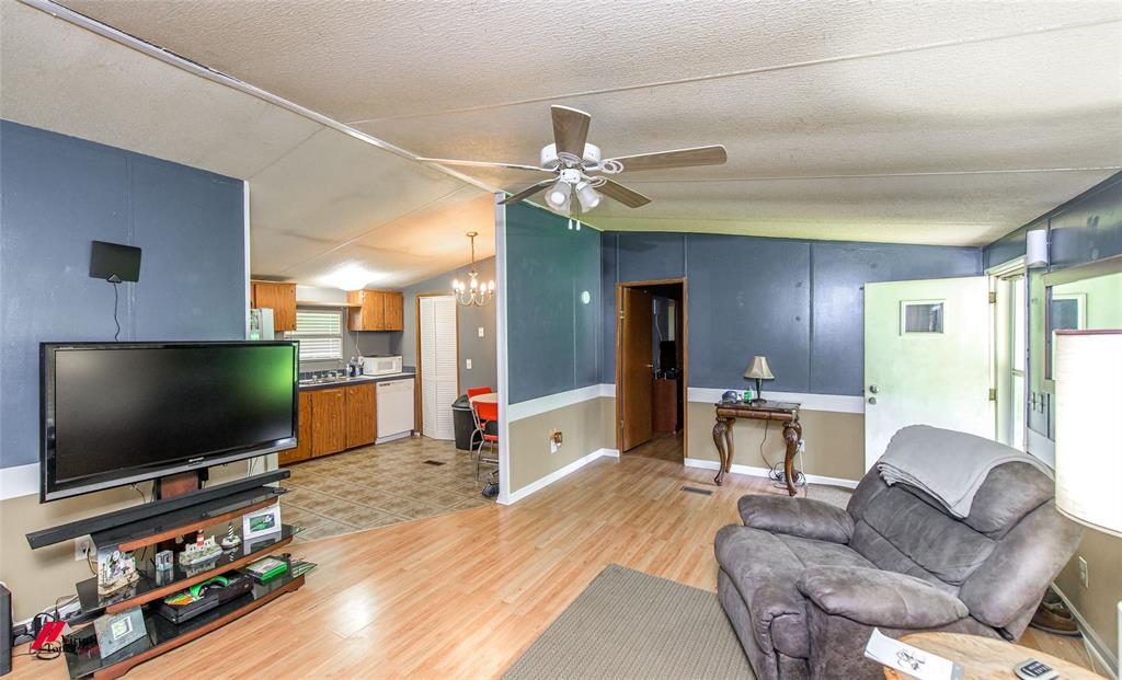 891 Pilgrim Rest Road Doyline, LA 71023 - Photo 17 of 37 a living room with furniture and a flat screen tv
