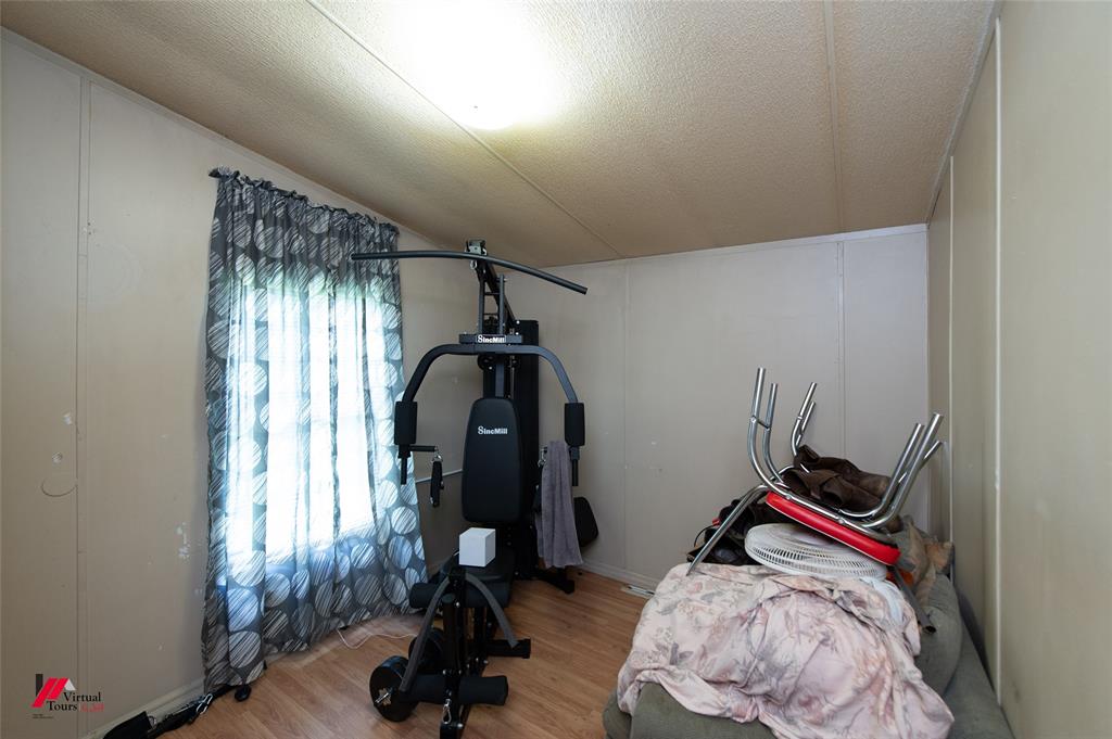 891 Pilgrim Rest Road Doyline, LA 71023 - Photo 27 of 37 a view of a room with gym equipment